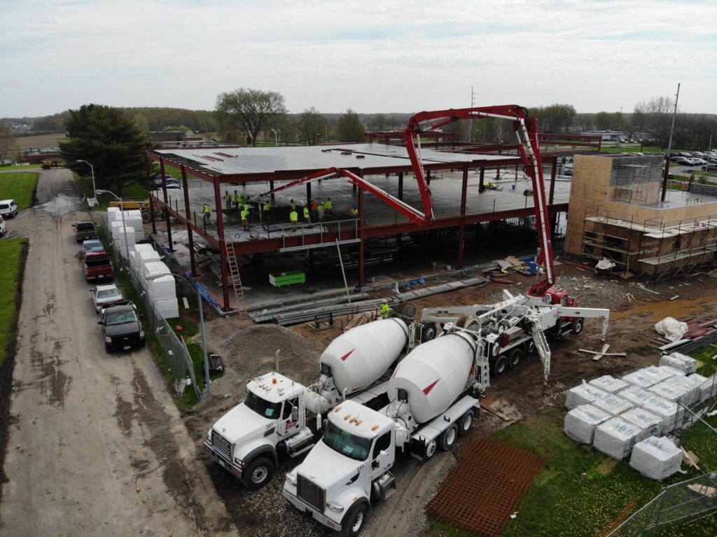 concrete flooring pour with 2 concrete trucks