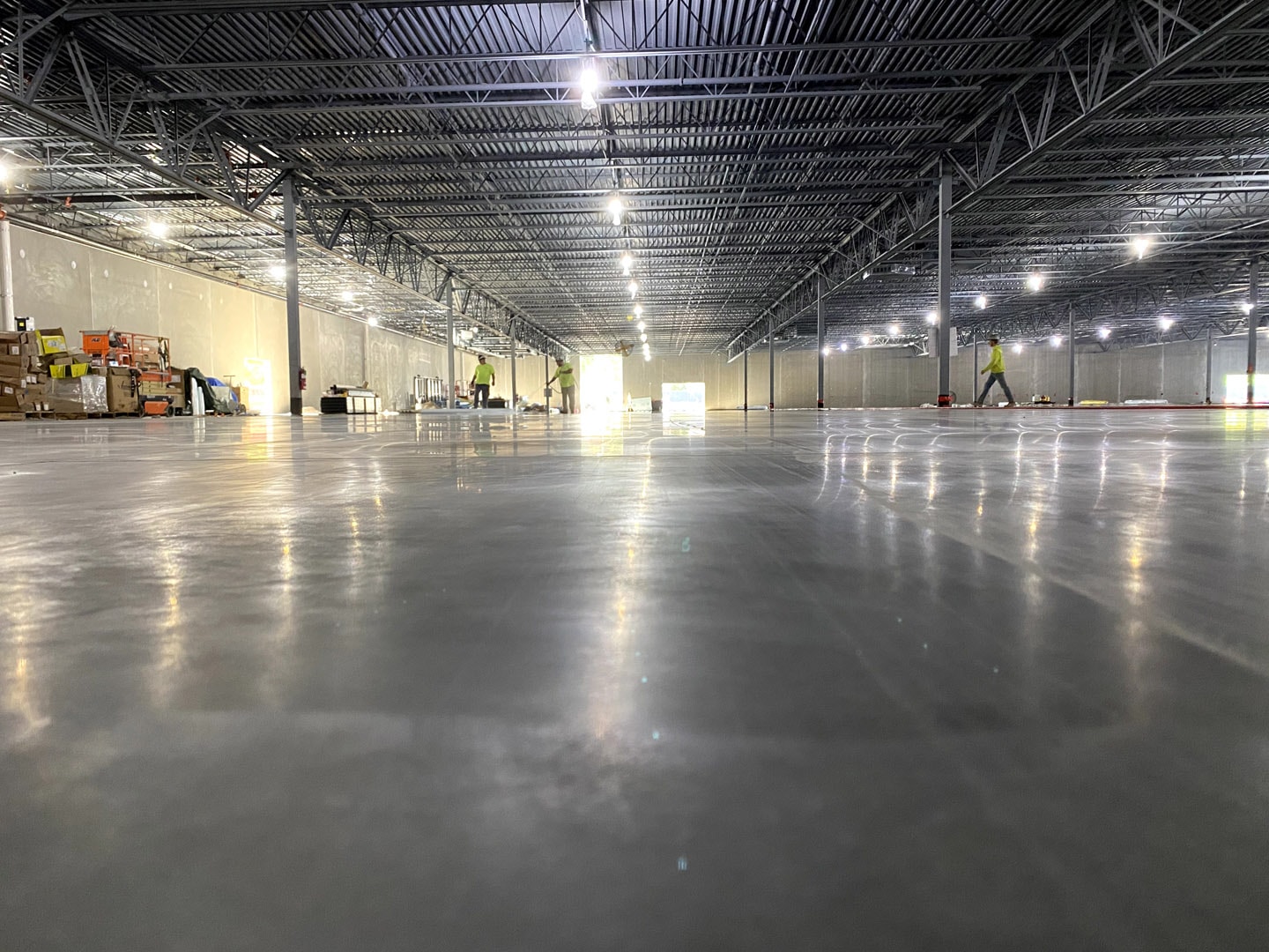 interior concrete flooring with workers