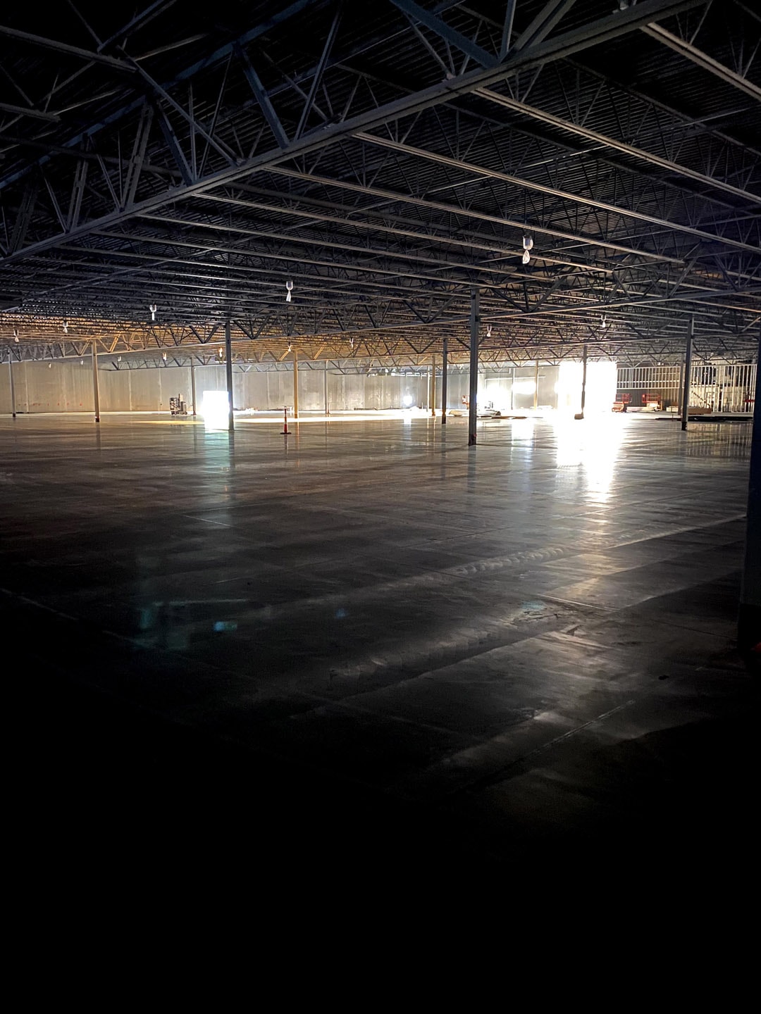 Interior new concrete flooring in empty industrial building