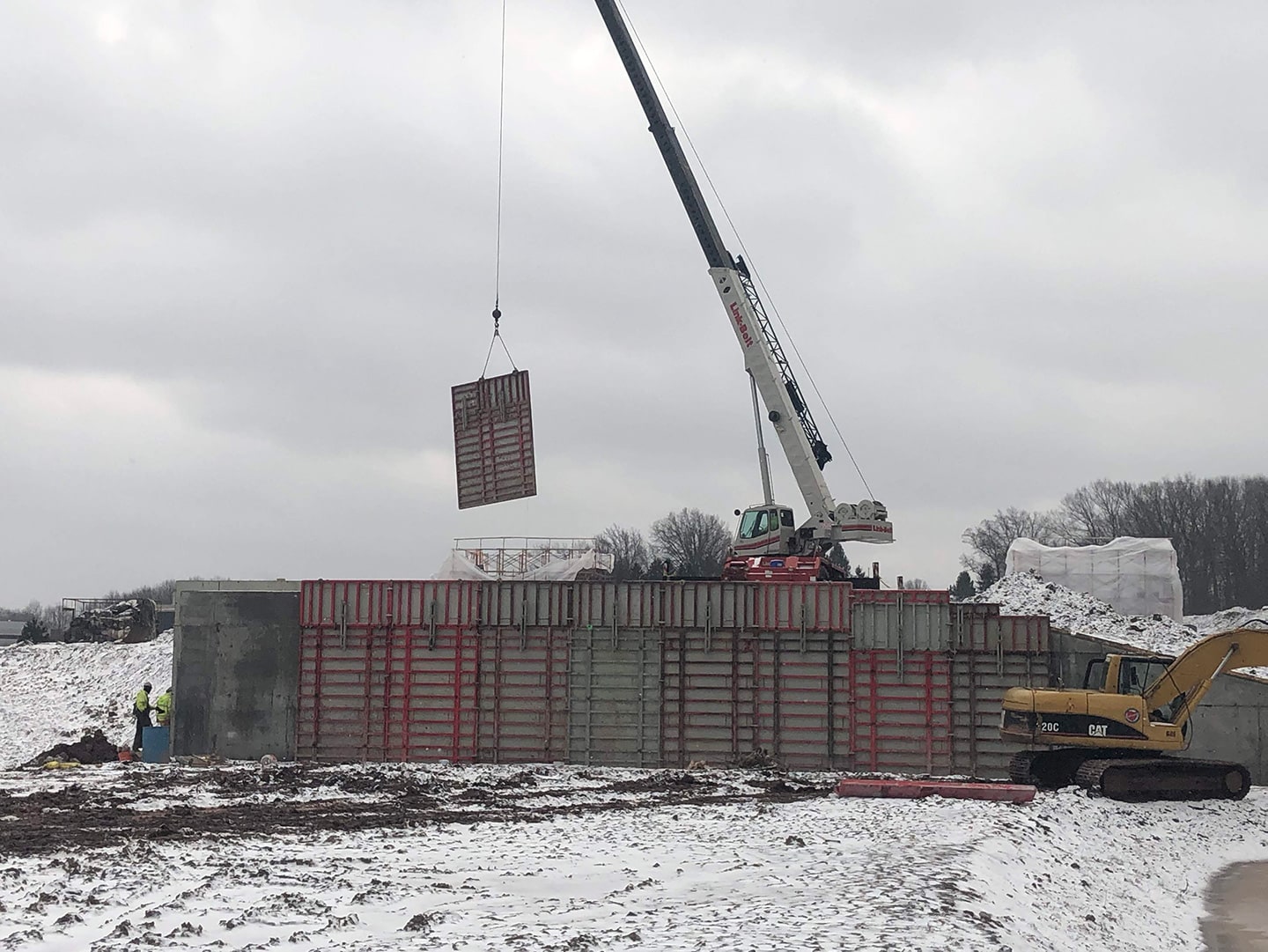 craning in concrete wall in winter time