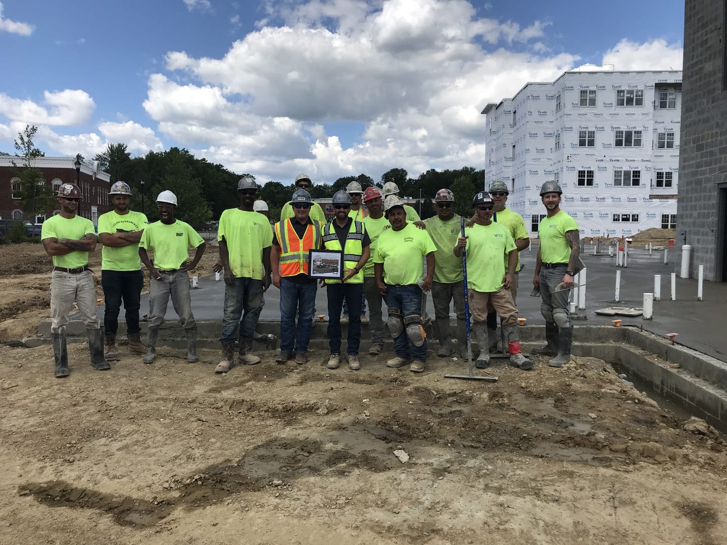 VMI team in front of exterior pavement